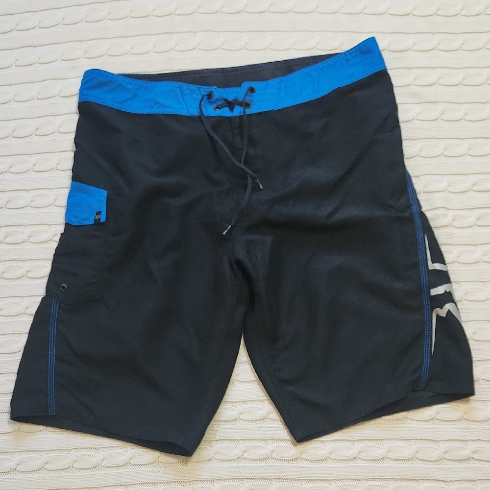 Fox Black and Blue Board Shorts Sleek Athletic Design